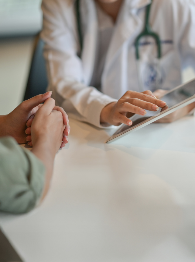 Photo: Physician discussing options with a patient